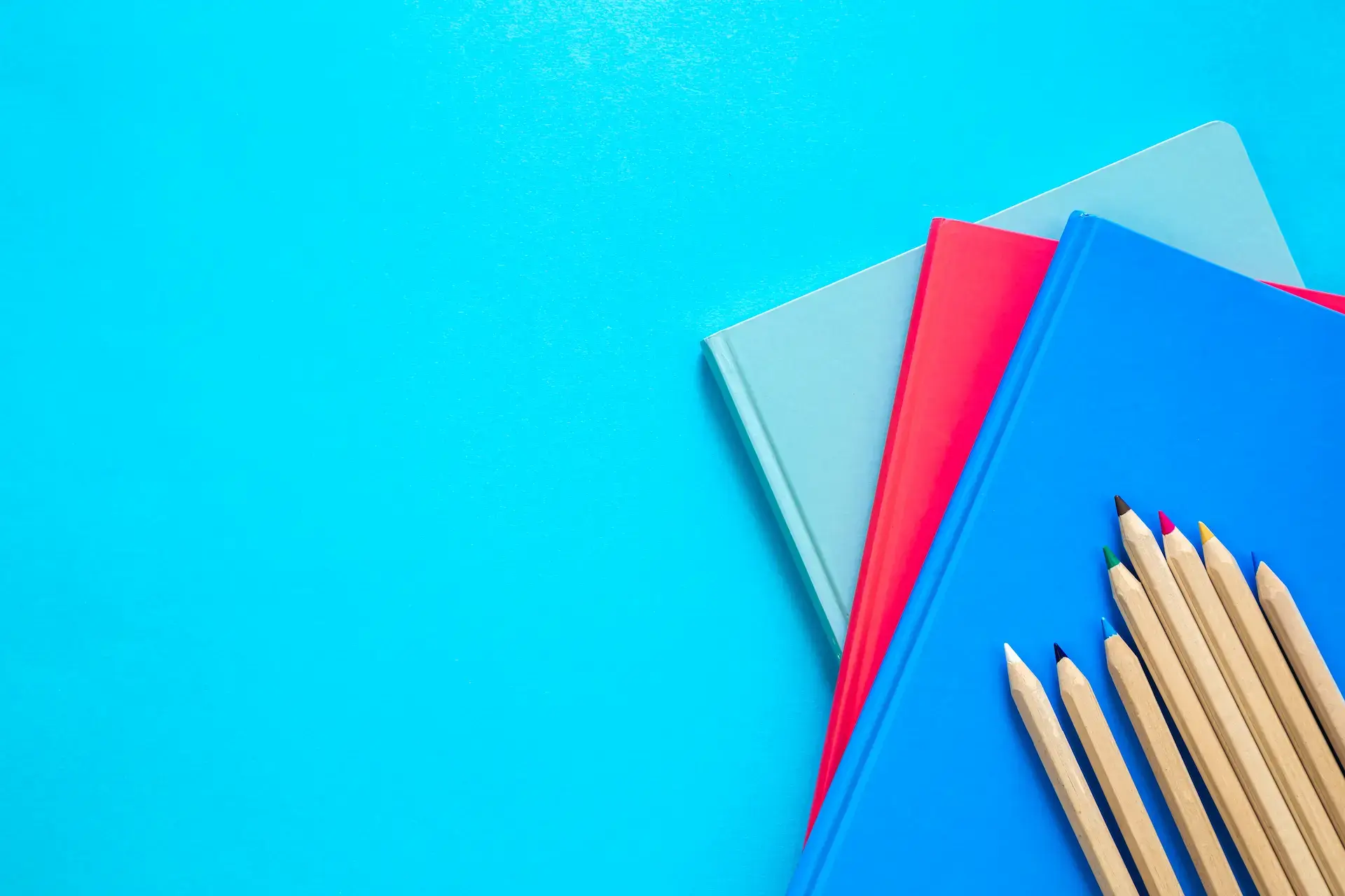 Notebooks and Pencils